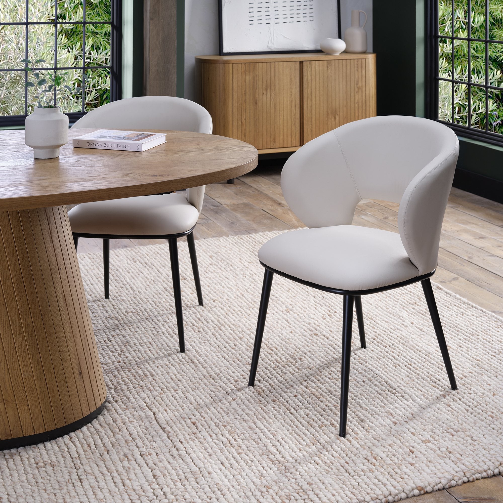 Luca - Ivory Faux Leather Chair with Matt Black Legs