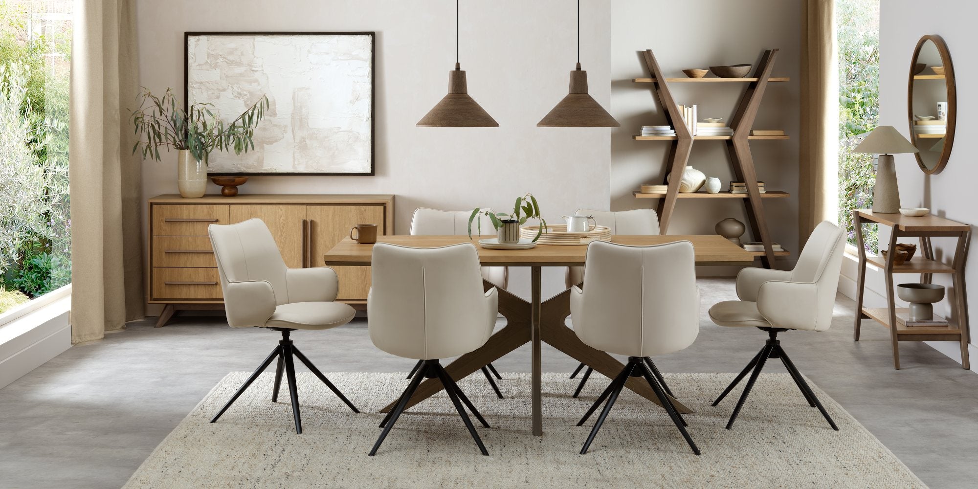 Rowan - 360° Self Returning Swivel Chair in a Ivory Faux Leather with Black Legs (Single)