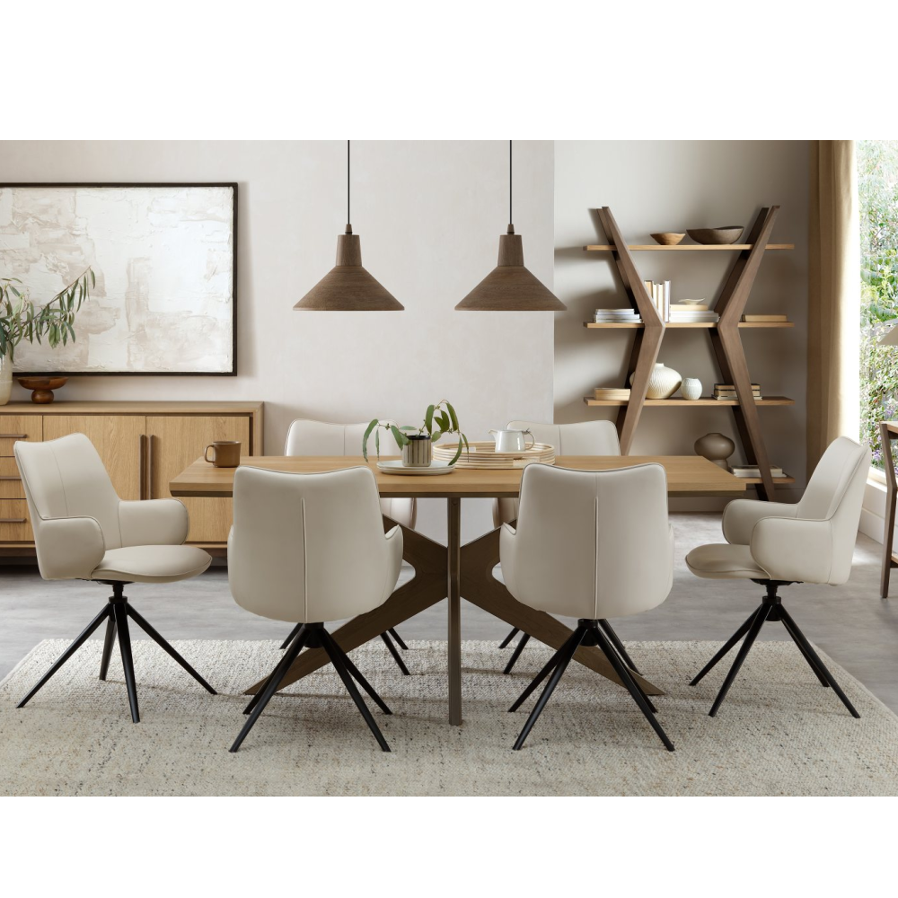 Rowan - 360° Self Returning Swivel Chair in a Ivory Faux Leather with Black Legs (Single)